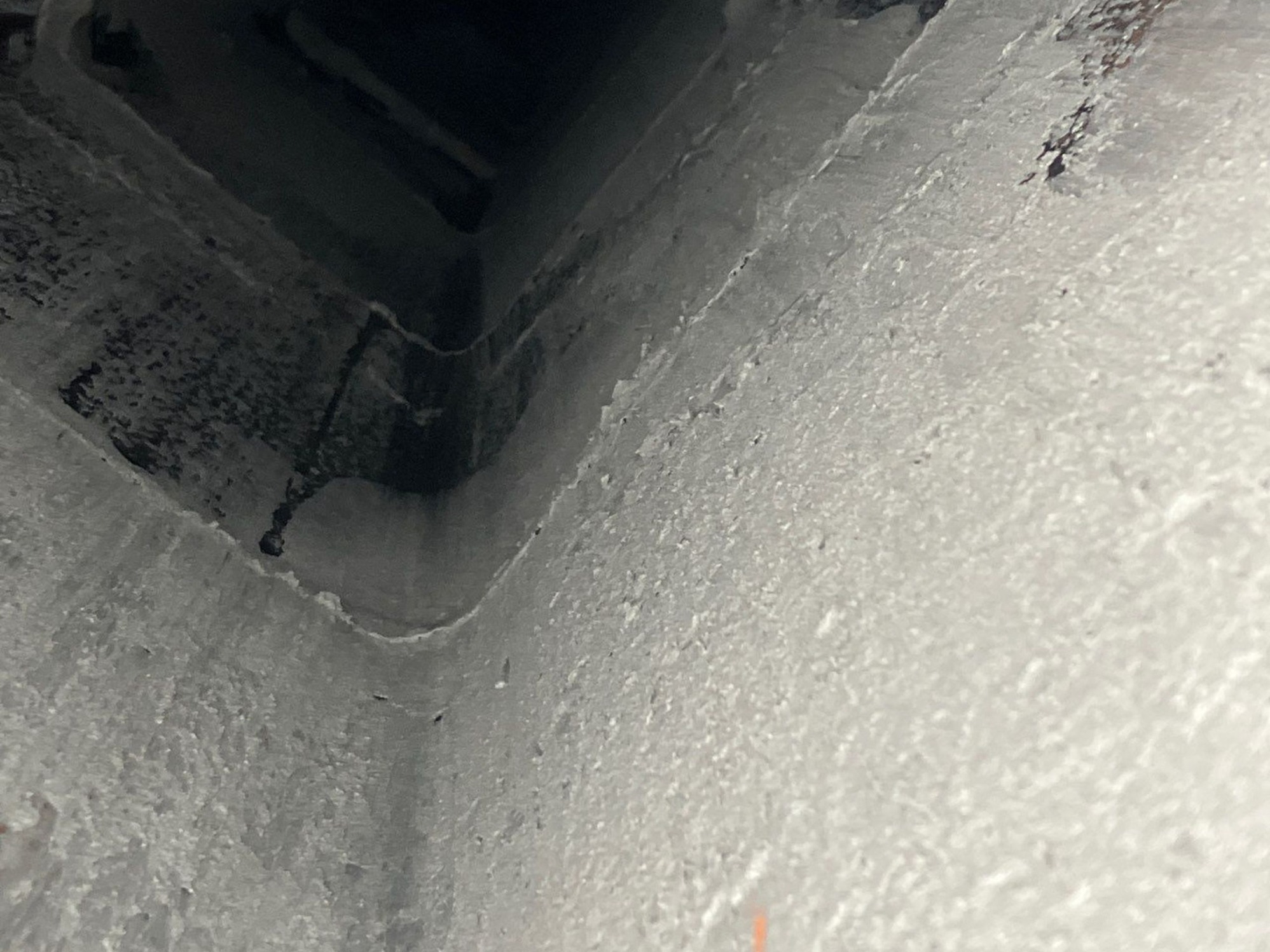 Fireguard cement to the chimney flue