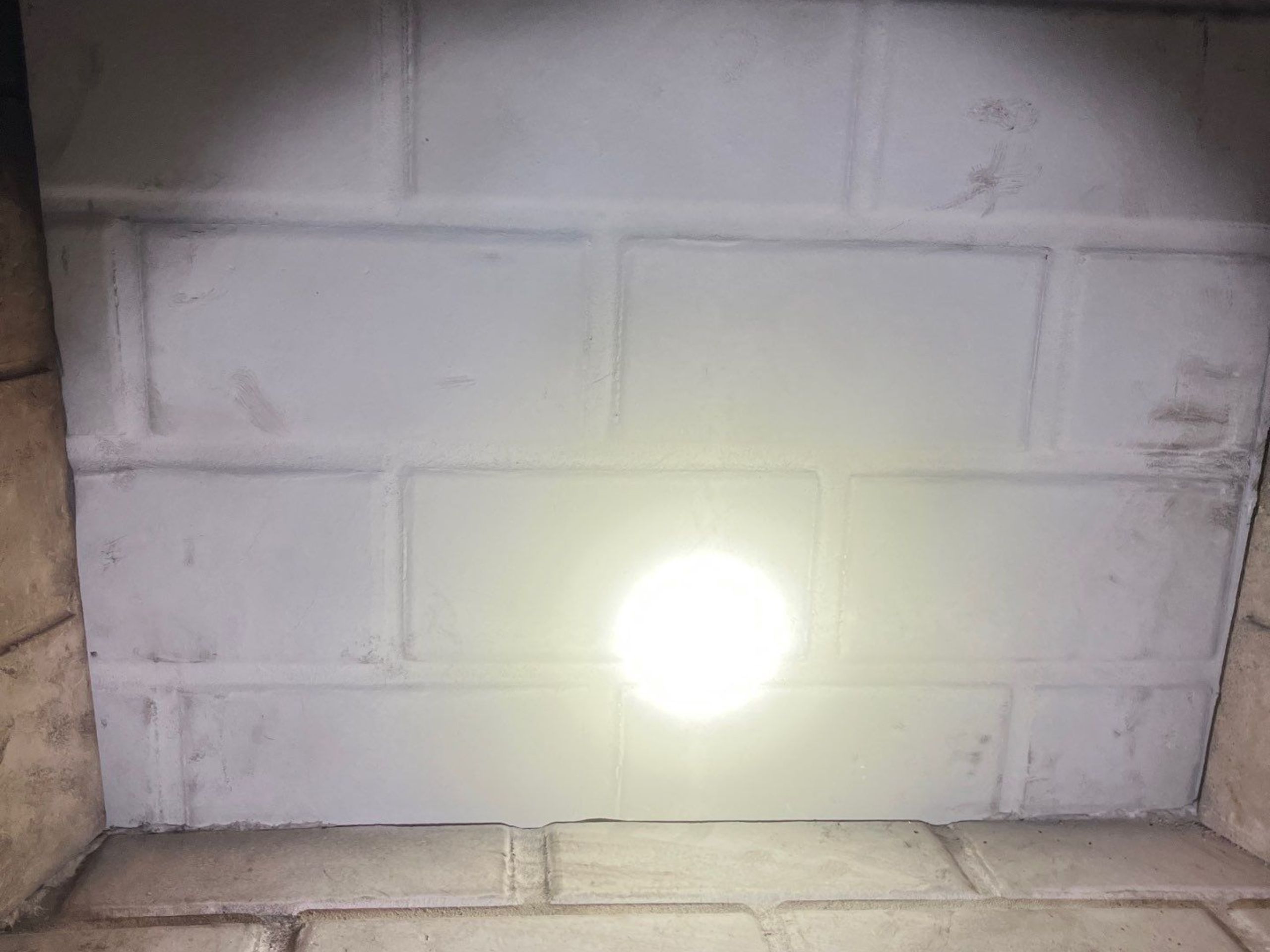 Refractory panel replaced and Sealed around fireplace